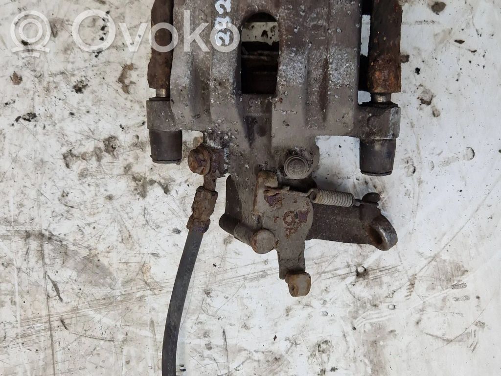 Saab 9-3 Ver2 Tylny zacisk hamulcowy 