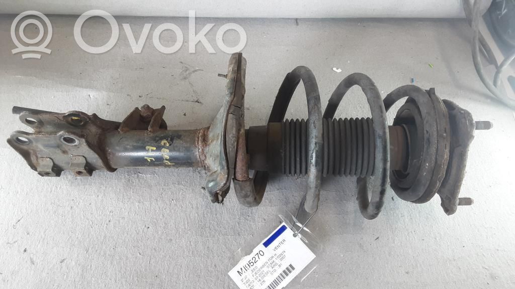 Front shock absorber with coil spring