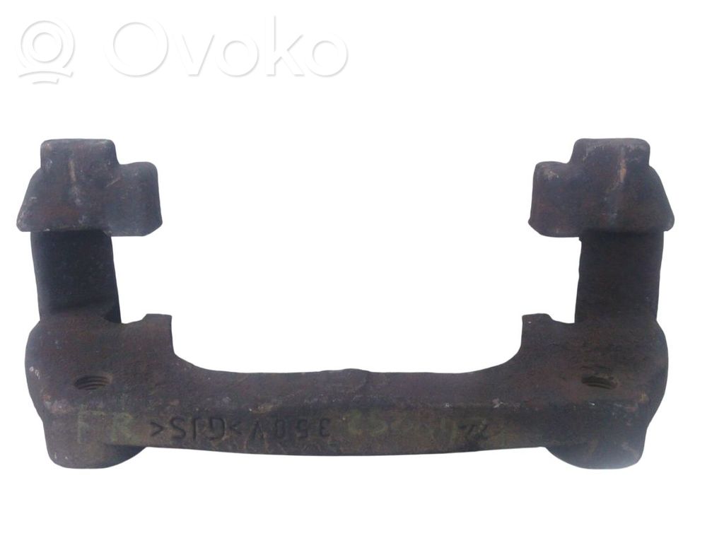 Mocowanie przedniego zacisku hamulca   7701059704