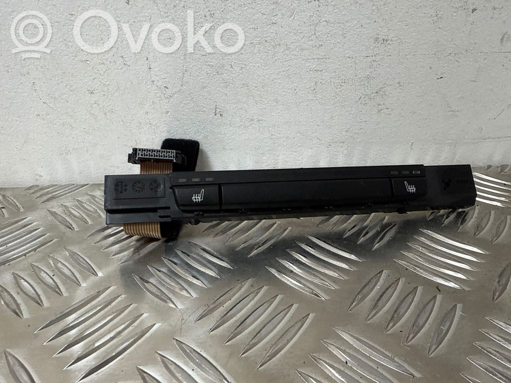Seat heating switch   6962604,03743670