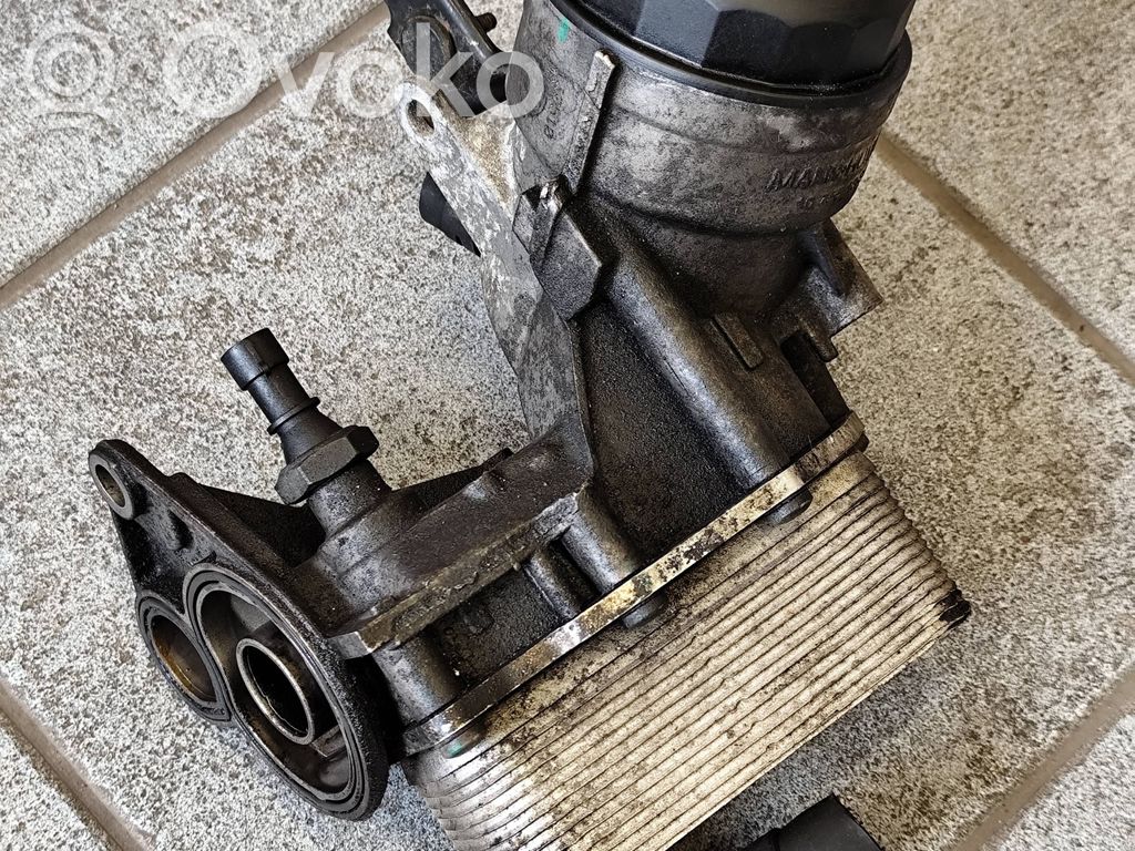 Opel Astra J Oil filter mounting bracket 