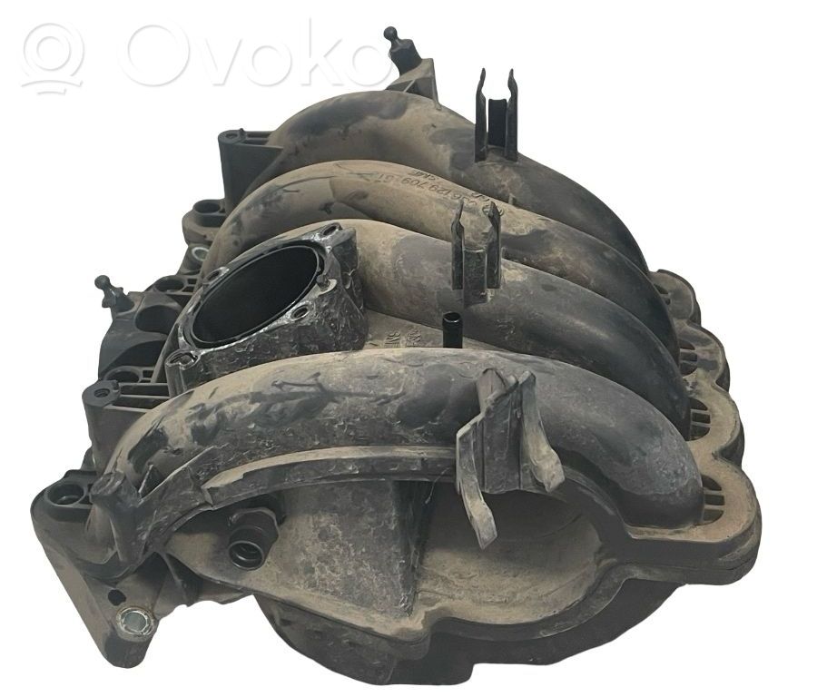 Volkswagen Golf V Kolektor ssący 
