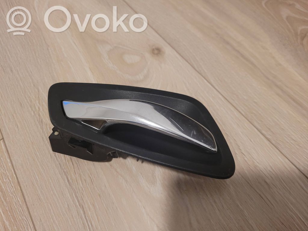 Etuoven sisäkahva   6975493,10628510