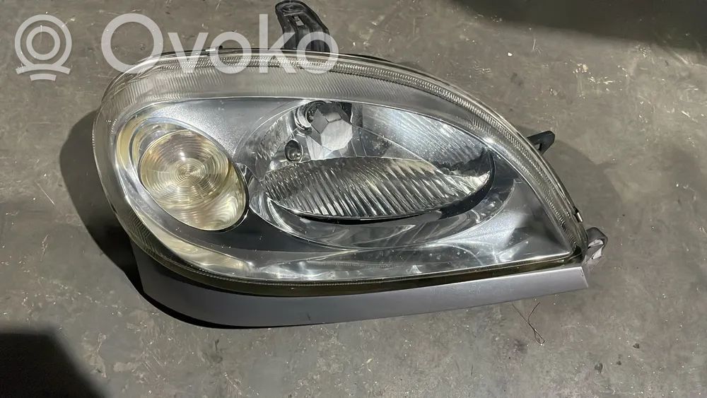 Renault Scenic I Priekinio žibinto detalė 