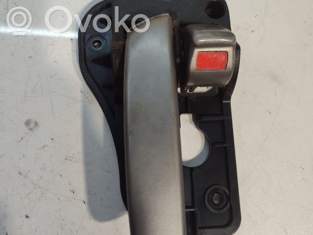 KIA Carens II Manecilla interna puerta trasera 