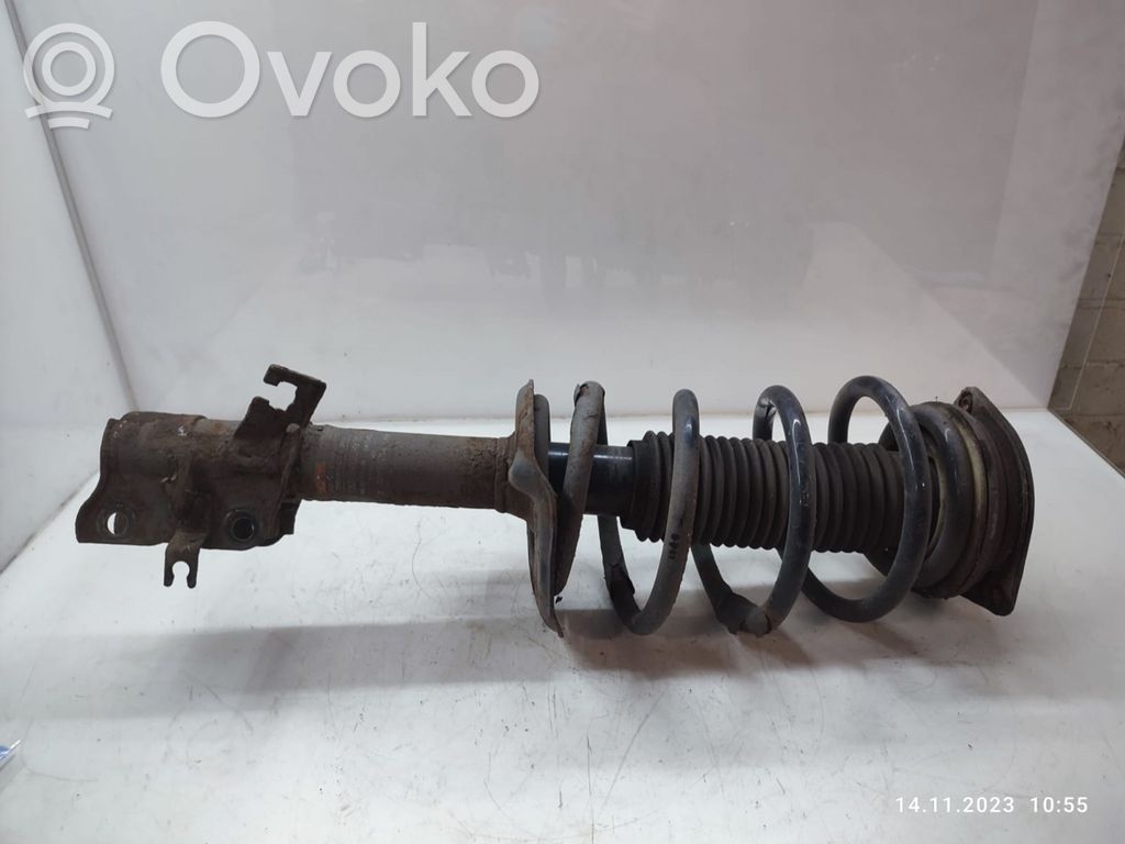 Nissan Qashqai+2 Amortyzator osi przedniej ze sprężyną 