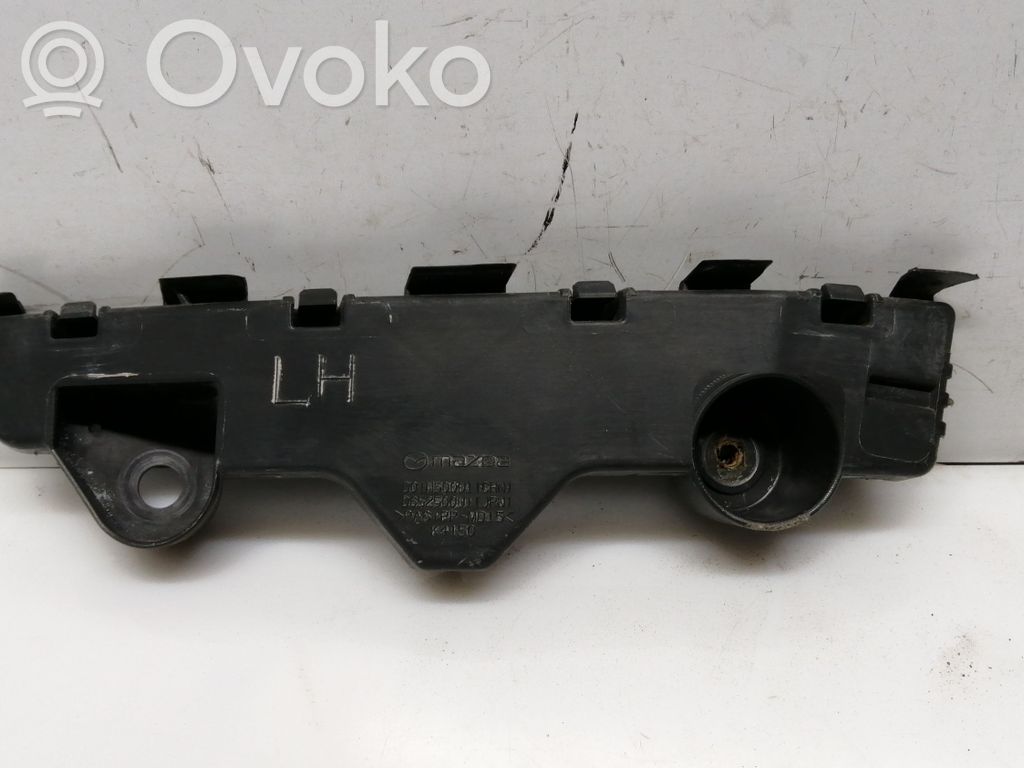 Mazda 2 Priekšpusē bampera turētājs 