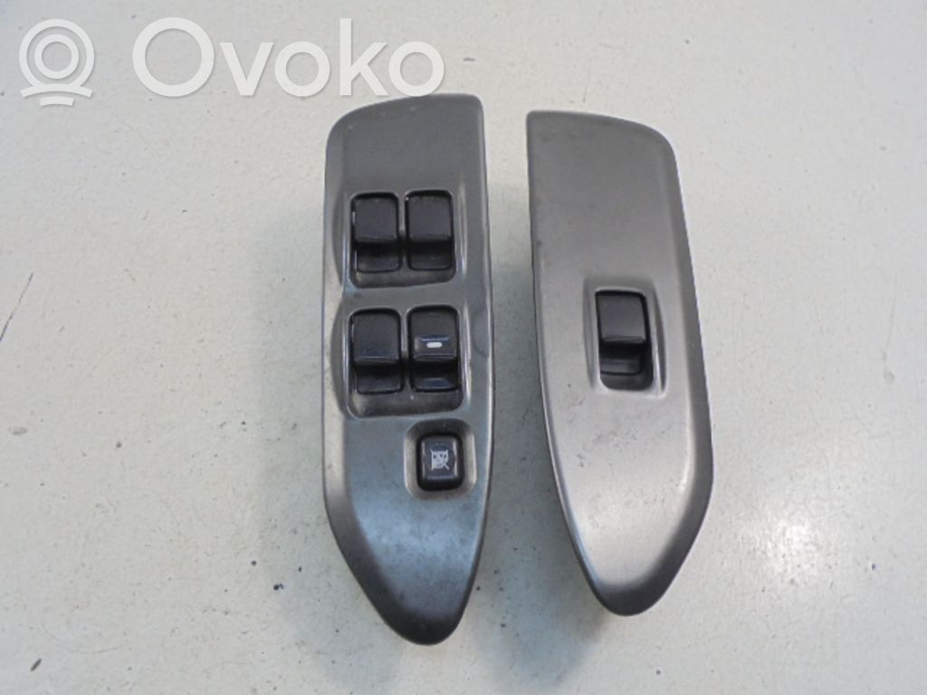 Mitsubishi Lancer VIII Electric window control switch 