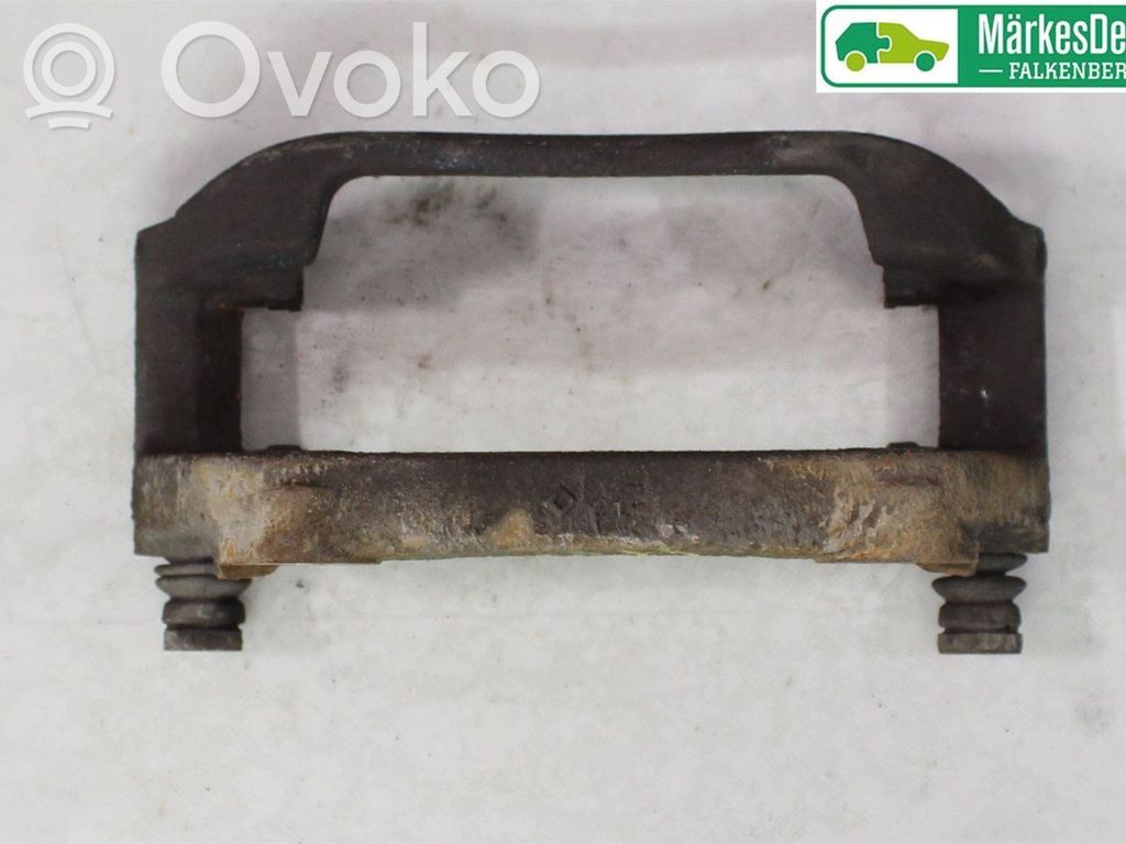 Mocowanie przedniego zacisku hamulca   7LA615125A