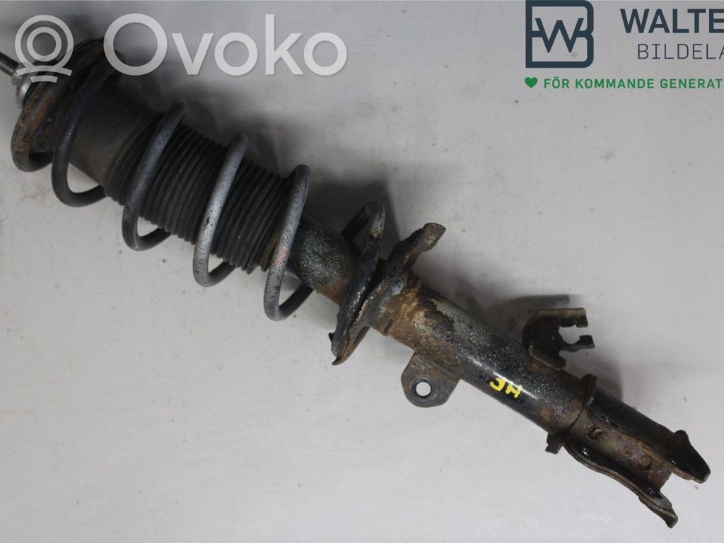 Nissan Note (E12) Front shock absorber with coil spring 