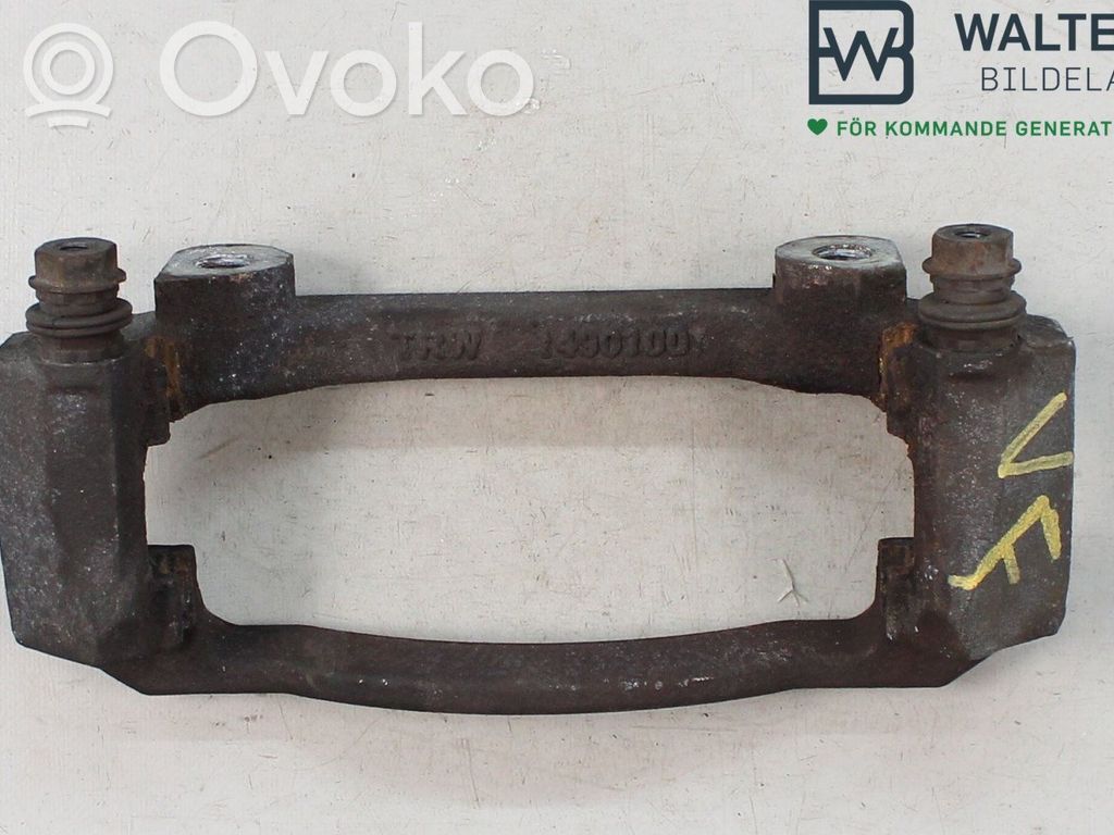 Plaquette / support d'étrier avant