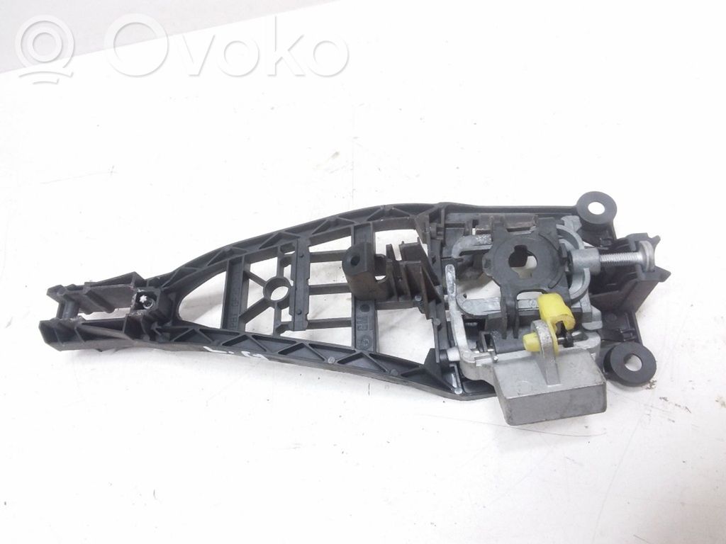 Opel Astra H Klamka/wspornik zewnętrzny drzwi tylnych 
