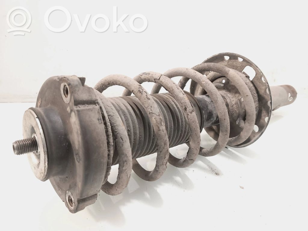 Volkswagen Polo Amortyzator osi przedniej ze sprężyną 