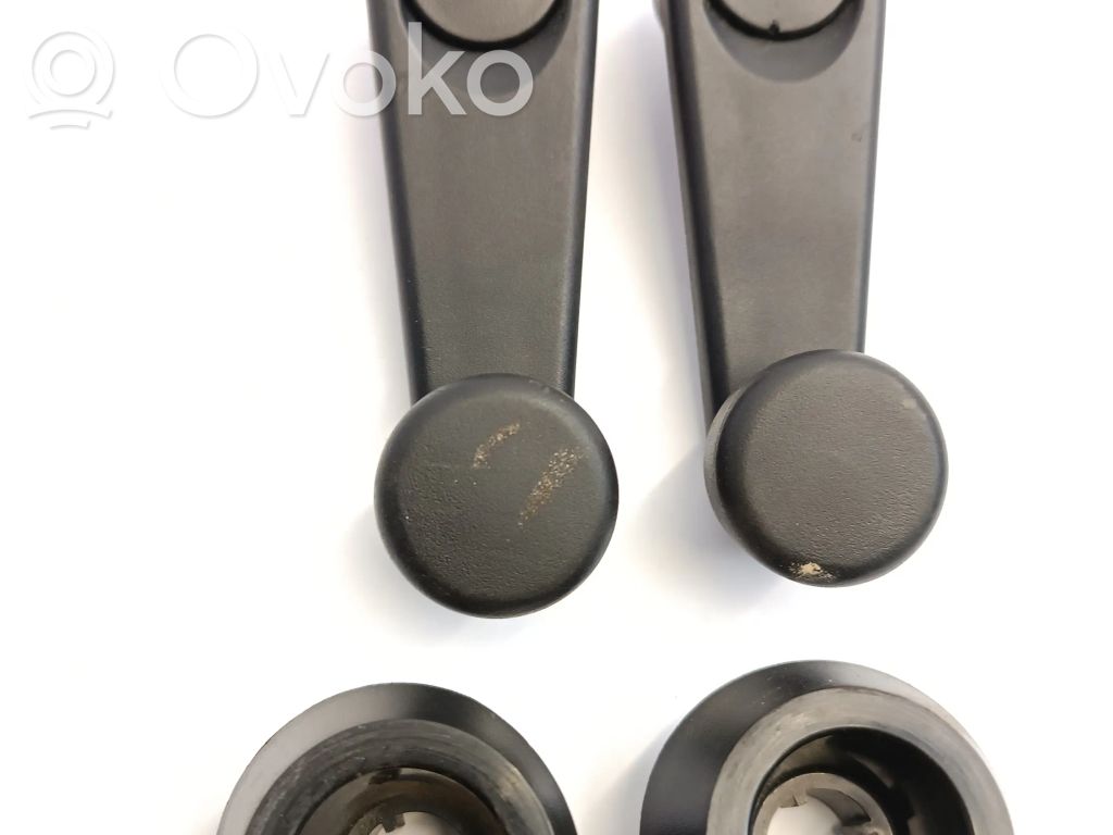 Rear door manual window regulator