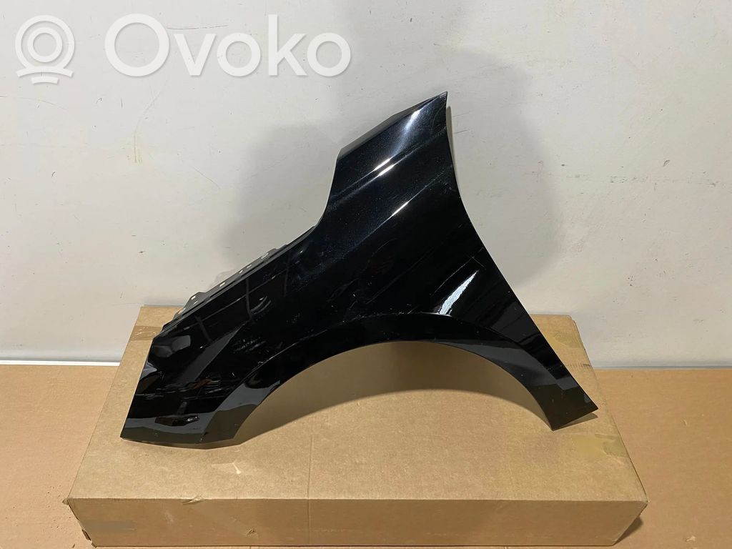 Opel Corsa F Błotnik przedni 