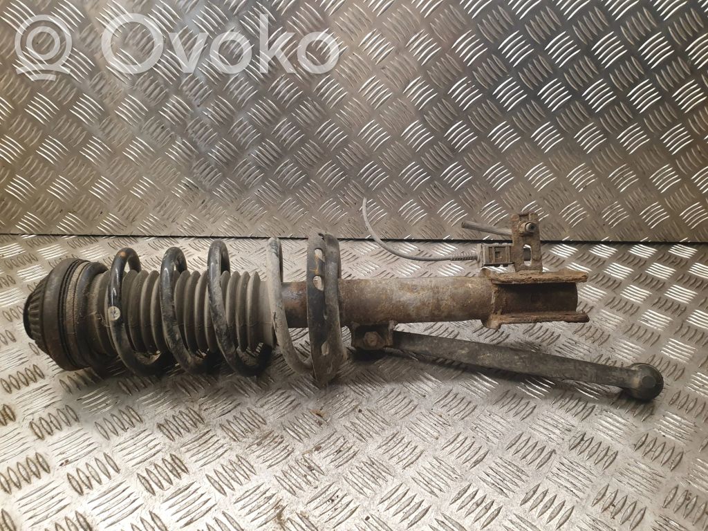 Opel Astra H Amortyzator osi przedniej ze sprężyną 
