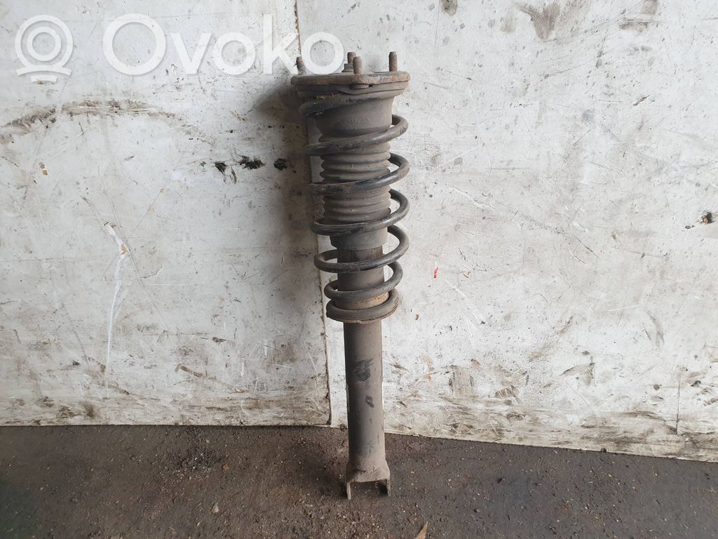 Front shock absorber with coil spring