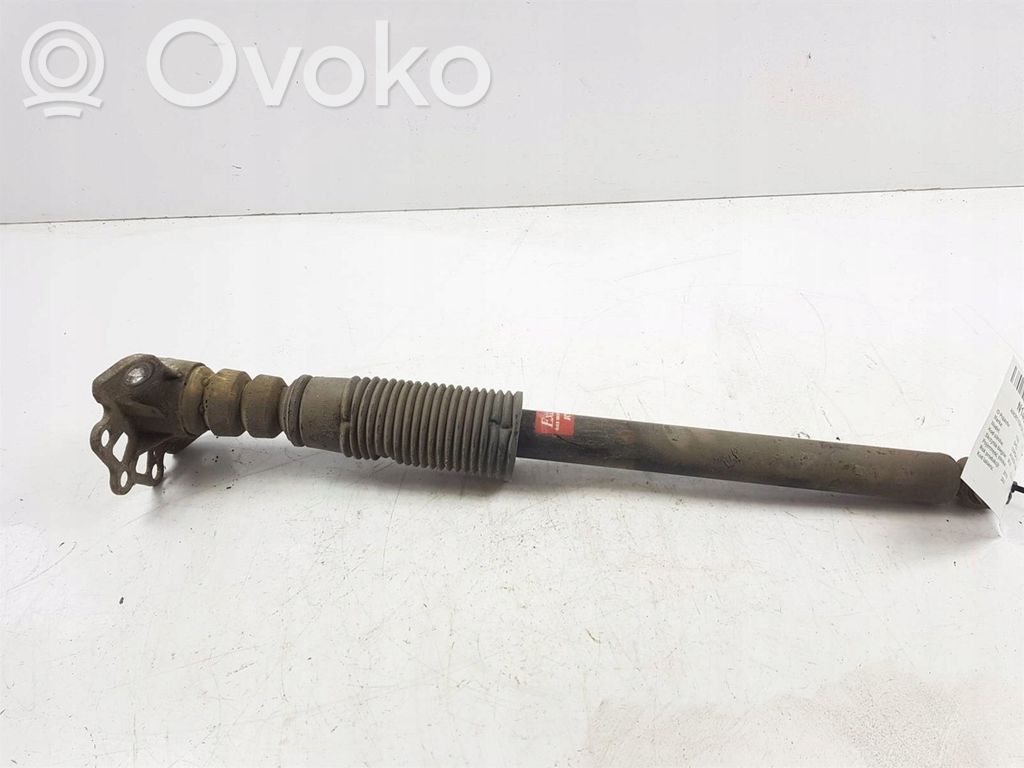 Opel Corsa D Aizmugurē amortizators 