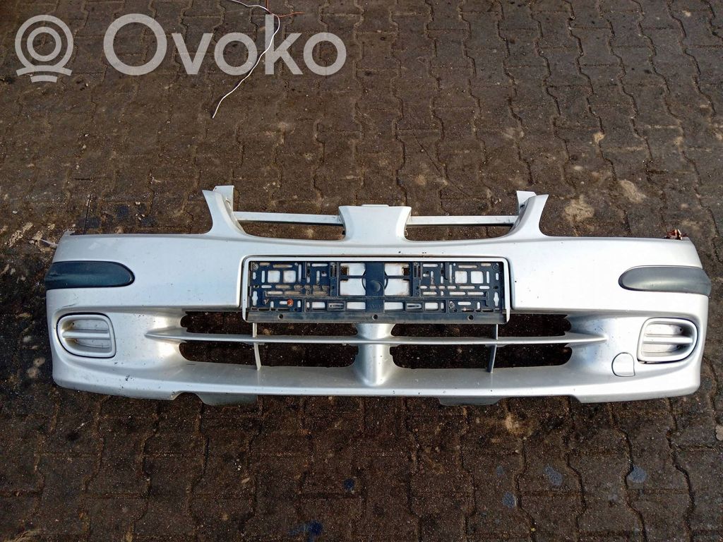 Nissan Almera N16 Parachoques delantero 