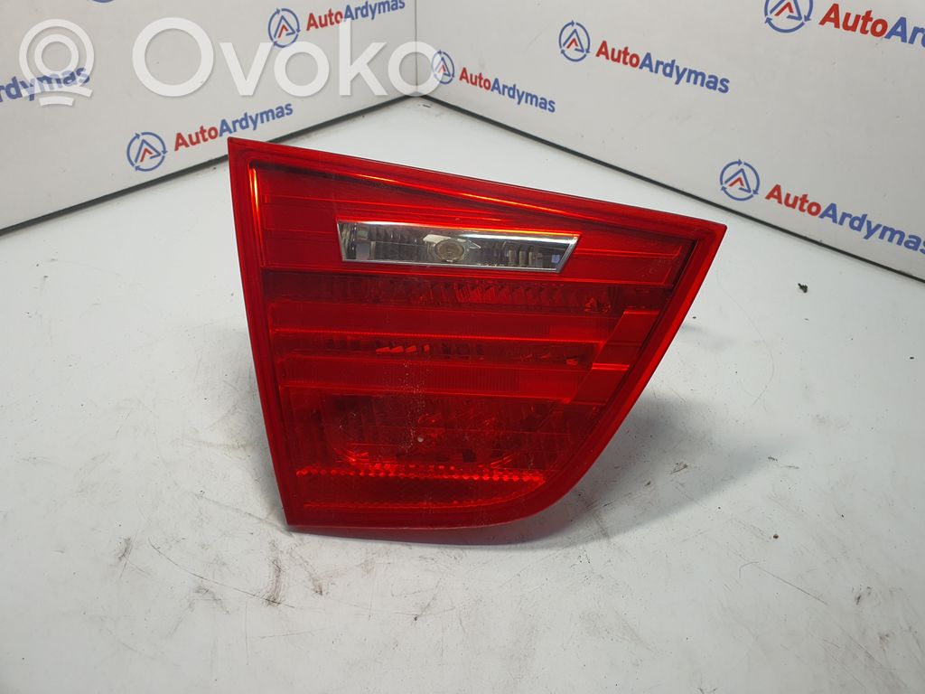 BMW 3 E90 E91 Aizmugurējais lukturis pārsegā 