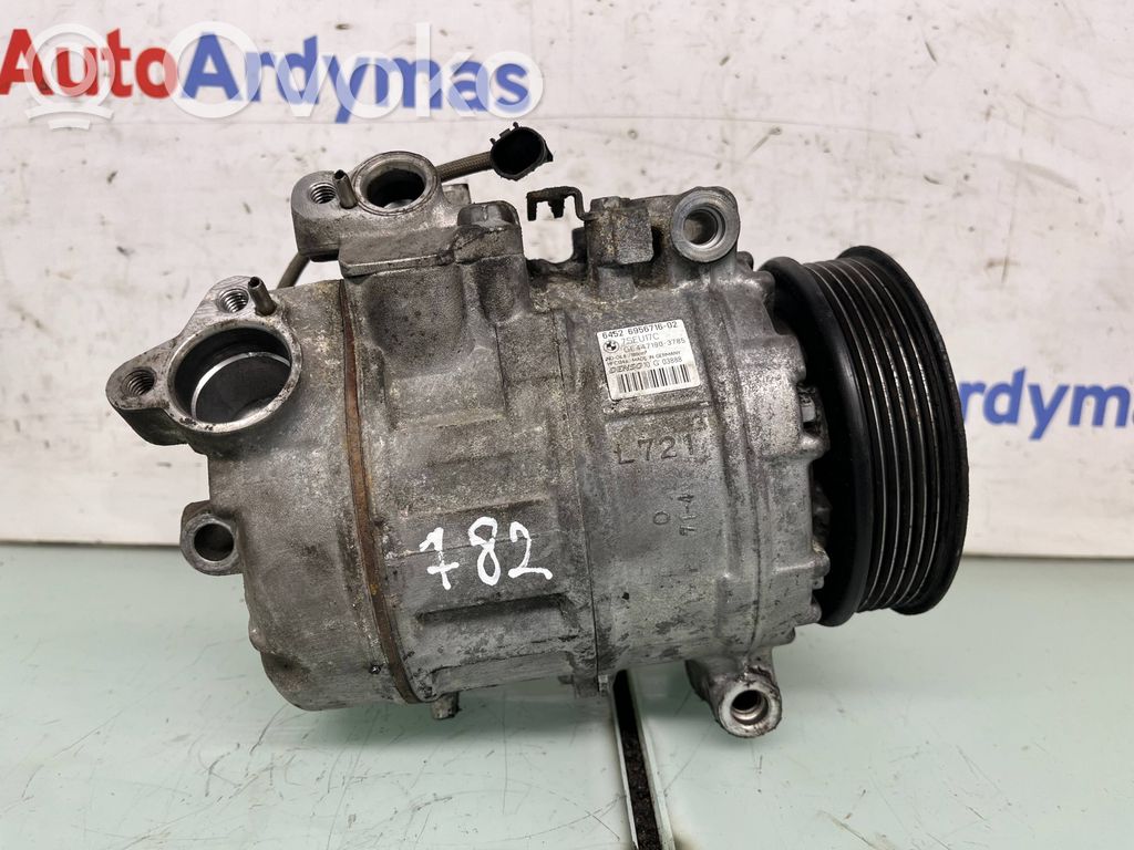 Ilmastointilaitteen kompressorin pumppu (A/C)   6956716,64526956716