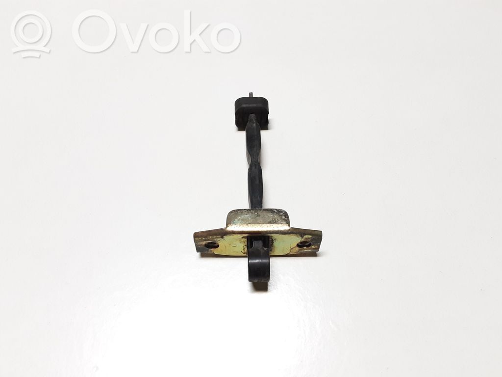 Front door check strap stopper