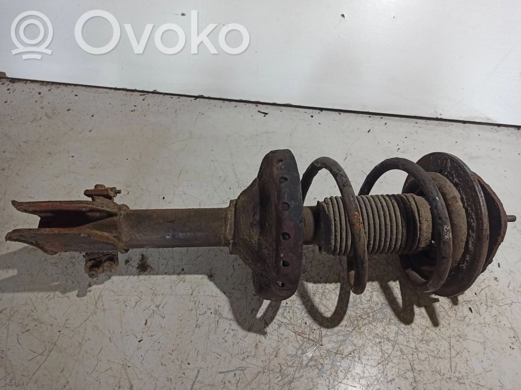 Front shock absorber with coil spring