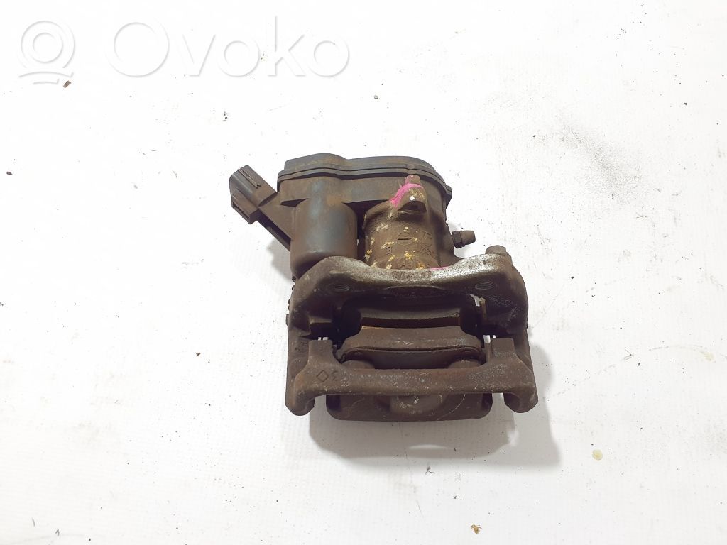 Renault Megane III Tylny zacisk hamulcowy 
