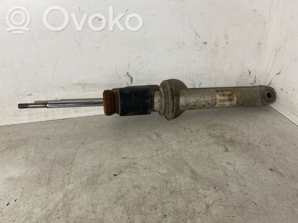 BMW 5 E60 E61 Aizmugurē amortizators 