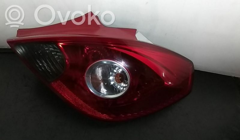 Opel Corsa D Aizmugurējais lukturis virsbūvē 