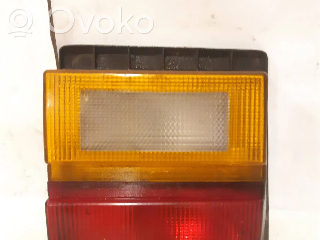 Audi 100 200 5000 C3 Aizmugurējais lukturis pārsegā 