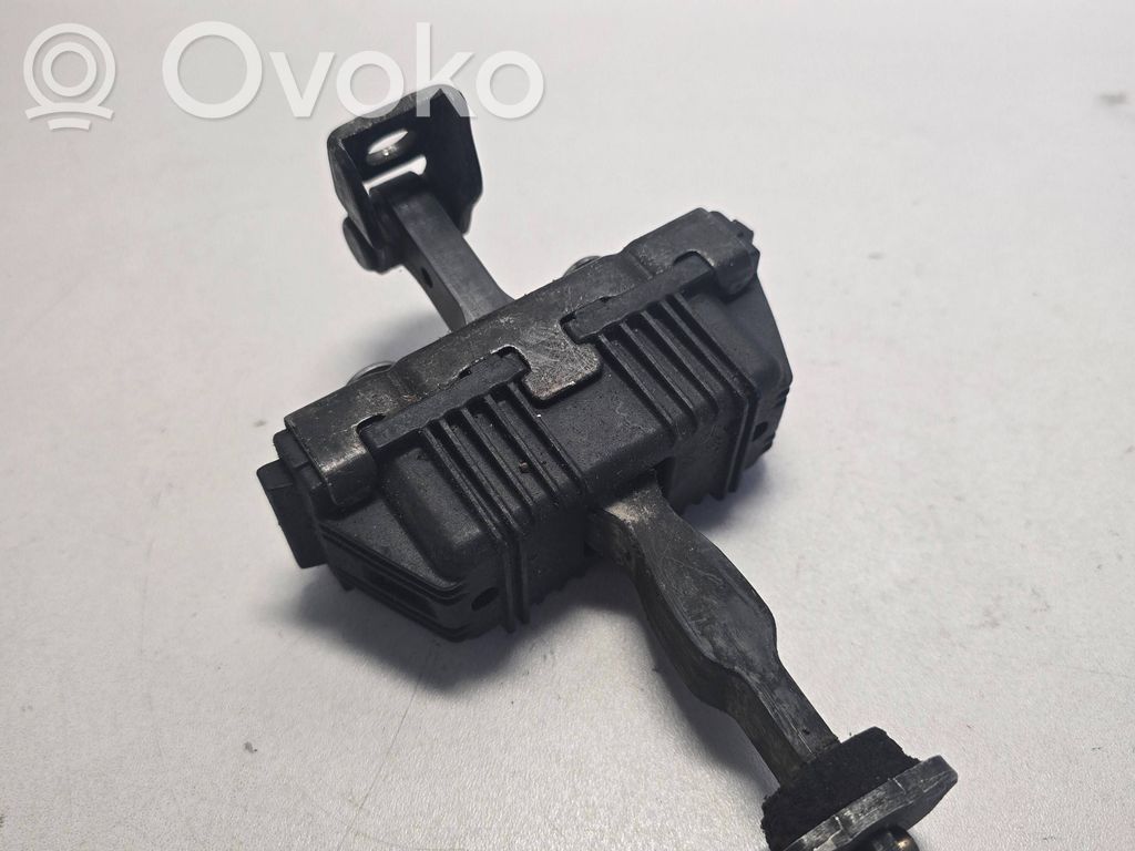 Front door check strap stopper   8402502