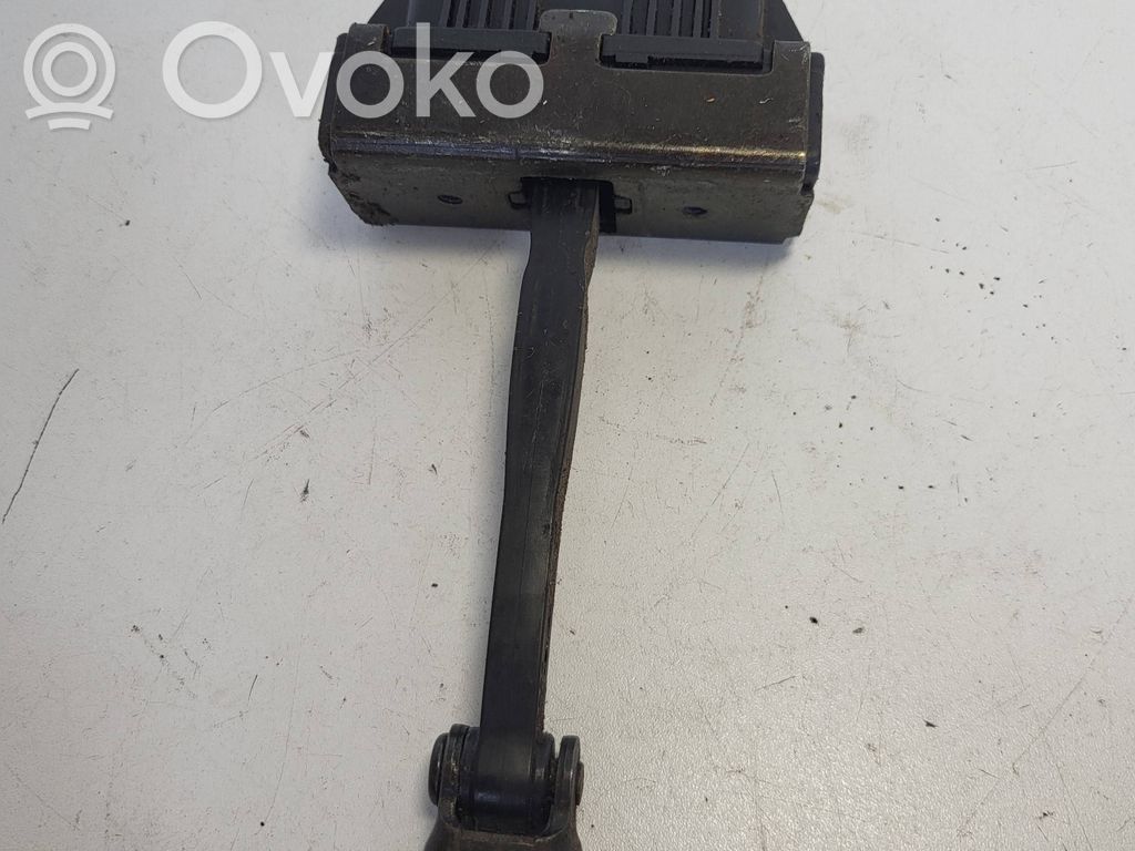 Front door check strap stopper   7033609