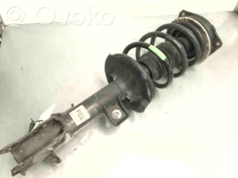 Nissan NV200 Front shock absorber with coil spring 