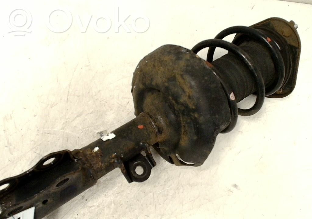 Toyota Corolla E210 E21 Front shock absorber with coil spring 