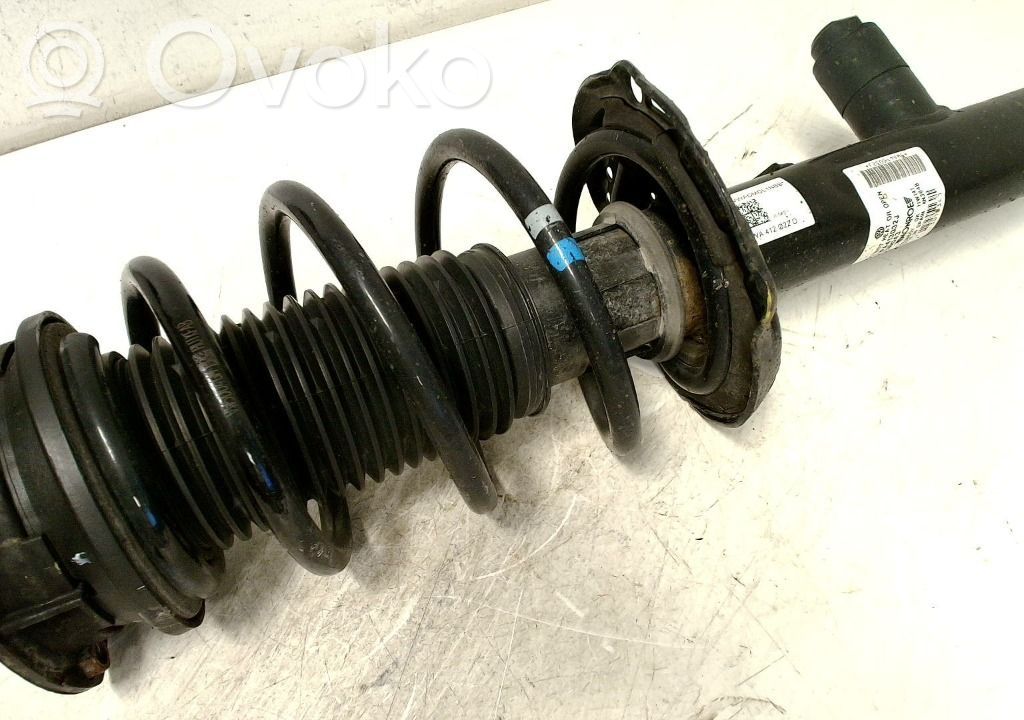 Skoda Octavia Mk4 Amortyzator osi przedniej ze sprężyną 