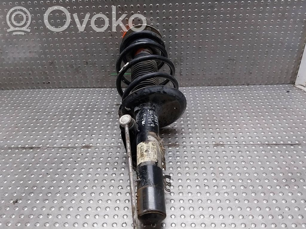 BMW X3 E83 Priekšpusē amortizators 