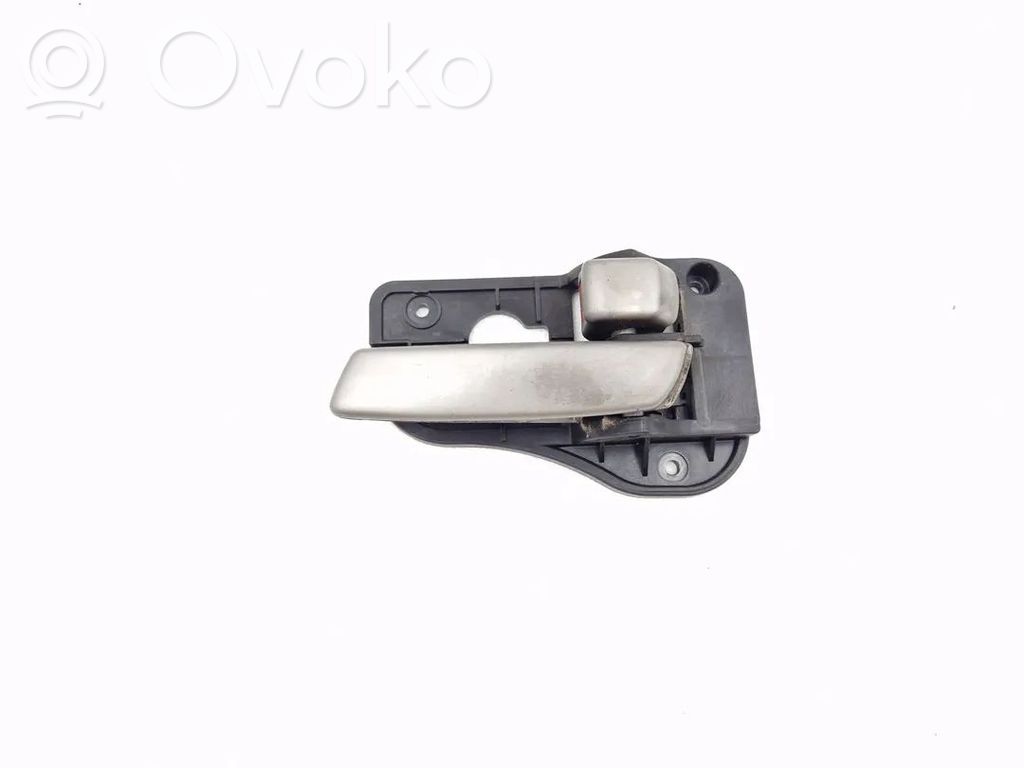 KIA Carens II Manecilla interna puerta delantera 