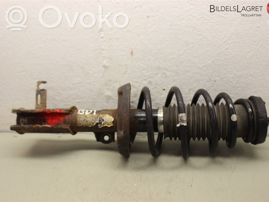 Opel Astra J Amortyzator osi przedniej ze sprężyną 