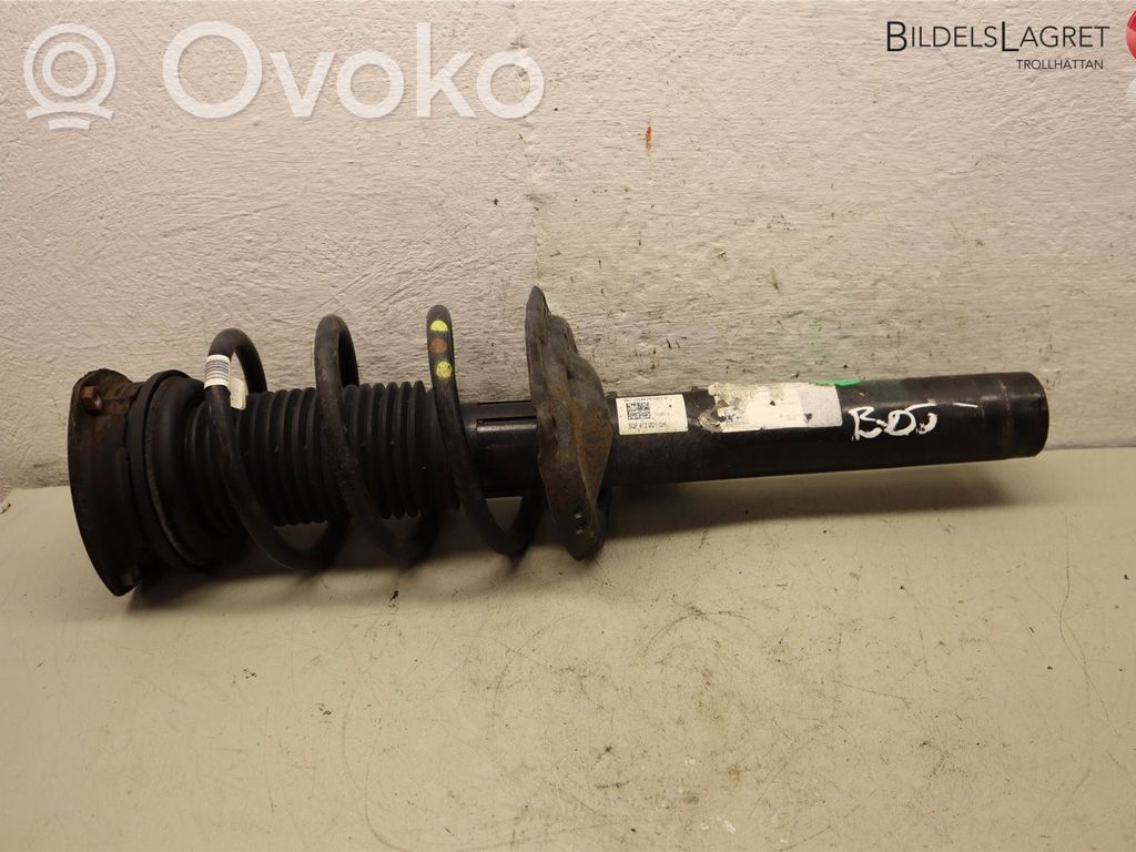 Volkswagen Tiguan Amortyzator osi przedniej ze sprężyną 