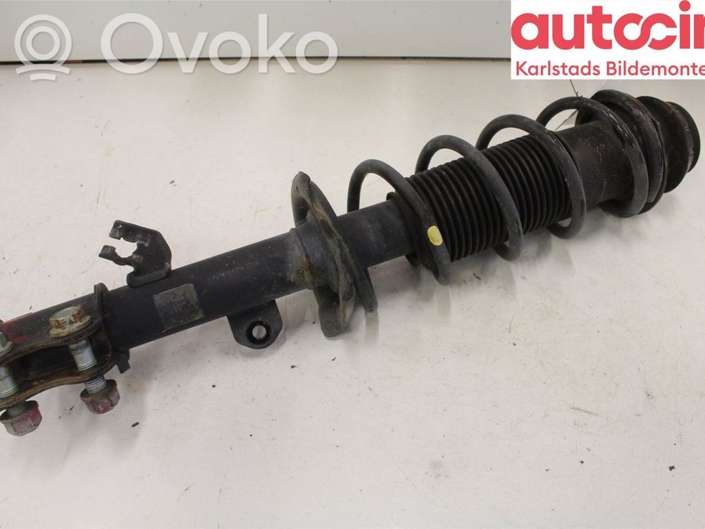 Nissan Note (E12) Front shock absorber with coil spring 