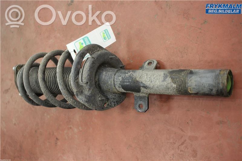 Front shock absorber with coil spring   1869799