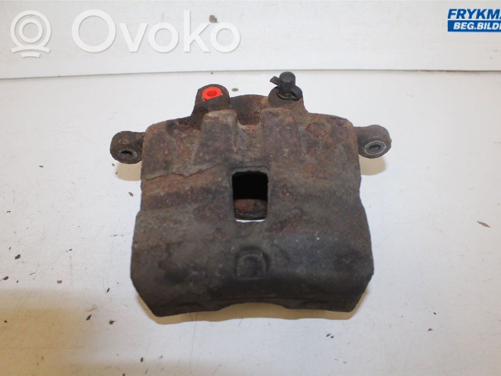 Opel Insignia A Zacisk hamulcowy przedni 