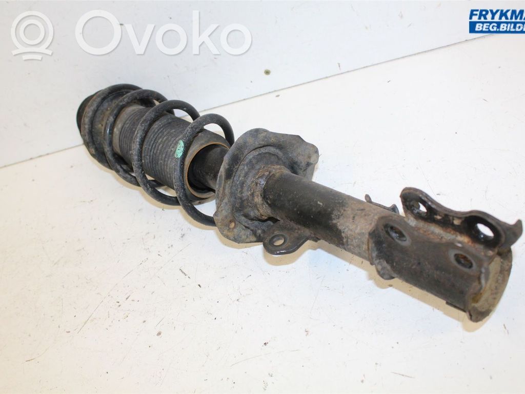Nissan Note (E12) Front shock absorber with coil spring 