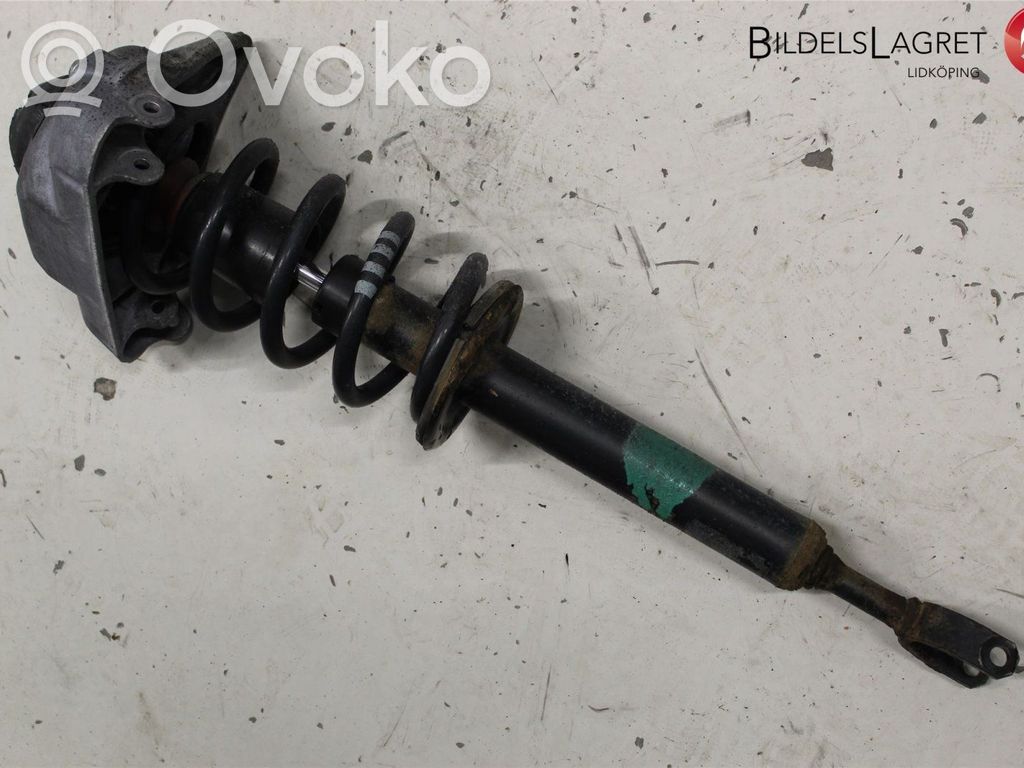 Audi A6 S6 C6 4F Front shock absorber with coil spring 