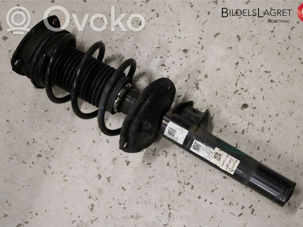 Volkswagen Golf Sportsvan Amortyzator osi przedniej ze sprężyną 