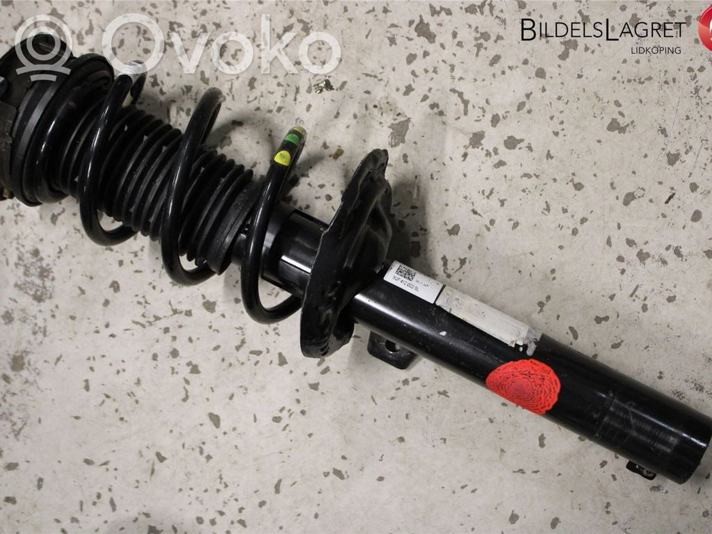 Volkswagen Tiguan Amortyzator osi przedniej ze sprężyną 