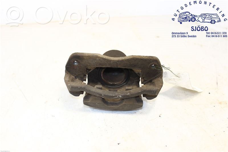 Mazda 323 Front brake caliper 