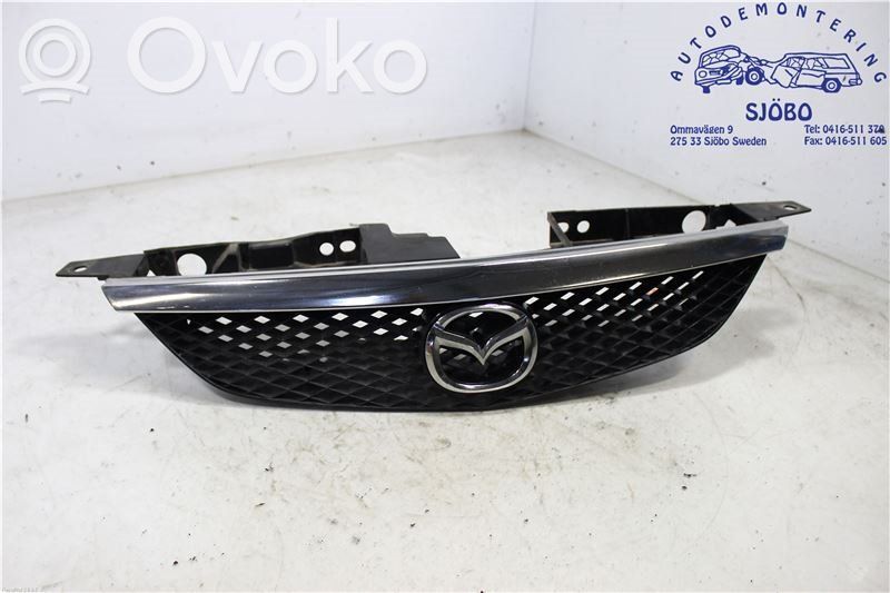 Mazda 323 Grotelės apatinės (trijų dalių) 