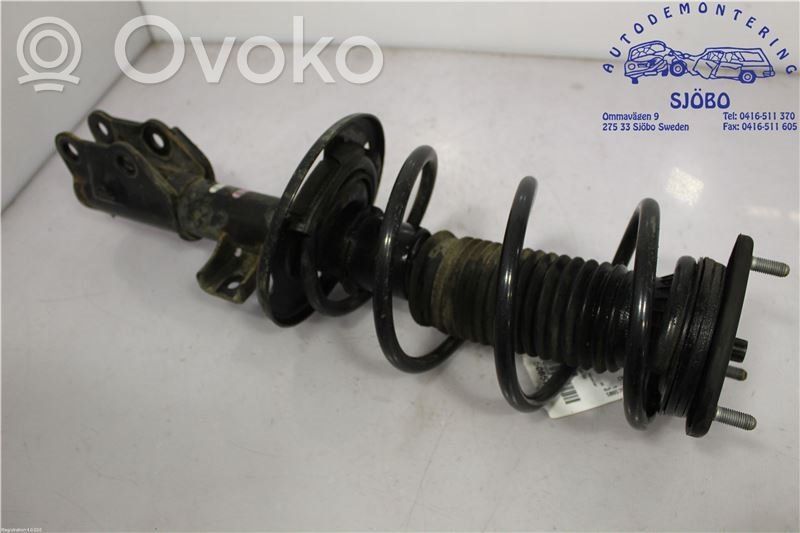Mazda 3 III Front shock absorber with coil spring 